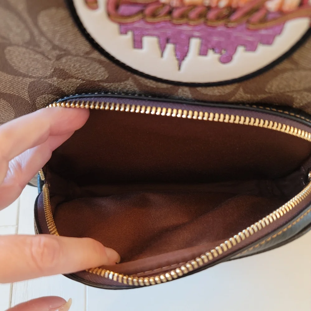 Coach Signature Brown Tan Backpack with Pink Trim and Purple Accent